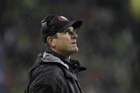 San Francisco 49ers head coach Jim Harbaugh looks on from the sidelines during the first quarter of their NFL football game against the Seat San Francisco 49ers head coach Jim Harbaugh looks on from the sidelines during the first quarter of their NFL football game against the Seat