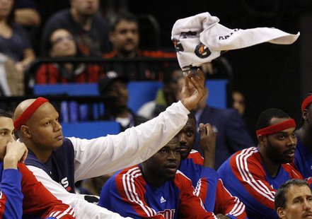 Detroit Pistons forward Charlie Villanueva tosses a towel while sitting on the bench during the second half of their NBA basketball game aga Detroit Pistons forward Charlie Villanueva tosses a towel while sitting on the bench during the second half of their NBA basketball game aga