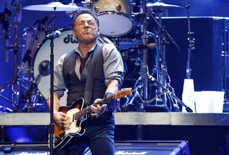 Singer Bruce Springsteen performs during the "12-12-12" benefit concert for victims of Superstorm Sandy at Madison Square Garden in New York Singer Bruce Springsteen performs during the "12-12-12" benefit concert for victims of Superstorm Sandy at Madison Square Garden in New York