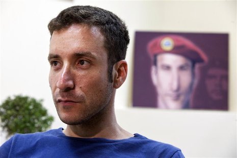 Itzik Shmuli, head of the National Student Union and one of the leaders of Israel's social protest movement, is seen during an interview wit Itzik Shmuli, head of the National Student Union and one of the leaders of Israel's social protest movement, is seen during an interview wit