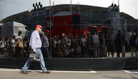 Former Austrian Formula One World Champion Niki Lauda walks in the paddock after the Italian F1 Grand Prix at the Monza circuit September 9, Former Austrian Formula One World Champion Niki Lauda walks in the paddock after the Italian F1 Grand Prix at the Monza circuit September 9,