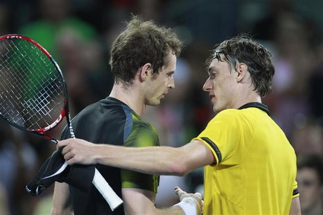 Andy Murray of Britain greets John Millman of Australia after their men's singles match at the Brisbane International tennis tournament Janu Andy Murray of Britain greets John Millman of Australia after their men's singles match at the Brisbane International tennis tournament Janu