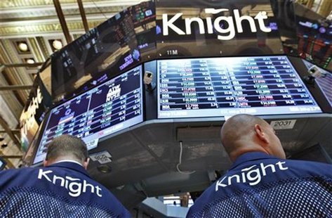 Knight Capital traders work at the company's kiosk on the floor of the New York Stock Exchange, August 6, 2012. REUTERS/Brendan McDermid Knight Capital traders work at the company's kiosk on the floor of the New York Stock Exchange, August 6, 2012. REUTERS/Brendan McDermid