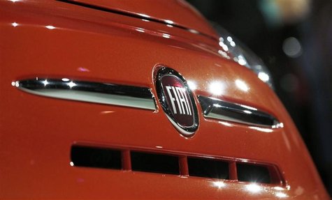 The Fiat logo is pictured at an event to introduce the 2013 Fiat 500 cars at the 2012 Los Angeles Auto Show in Los Angeles, California Novem The Fiat logo is pictured at an event to introduce the 2013 Fiat 500 cars at the 2012 Los Angeles Auto Show in Los Angeles, California Novem
