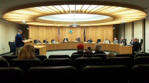 The smaller size of the Commission left so much room between the dais and the audience that it prompted Maturen to ask "Who Shrunk the board?" The smaller size of the Commission left so much room between the dais and the audience that it prompted Maturen to ask "Who Shrunk the board?"