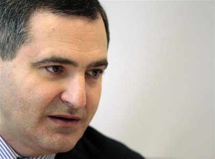 Lev Khasis, CEO of X5 Retail Group, speaks with journalists at Reuters office in Moscow, September 15, 2010. REUTERS/Alexander Natruskin Lev Khasis, CEO of X5 Retail Group, speaks with journalists at Reuters office in Moscow, September 15, 2010. REUTERS/Alexander Natruskin