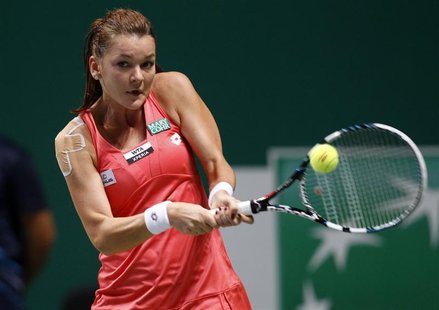 Poland's Agnieszka Radwanska hits a return to Serena Williams of the U.S. during their semifinals WTA tennis championships match in Istanbul Poland's Agnieszka Radwanska hits a return to Serena Williams of the U.S. during their semifinals WTA tennis championships match in Istanbul