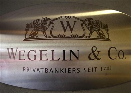 A logo of the Swiss bank Wegelin is pictured at a building in Bern, January 27, 2012. REUTERS/Michael Buholzer A logo of the Swiss bank Wegelin is pictured at a building in Bern, January 27, 2012. REUTERS/Michael Buholzer