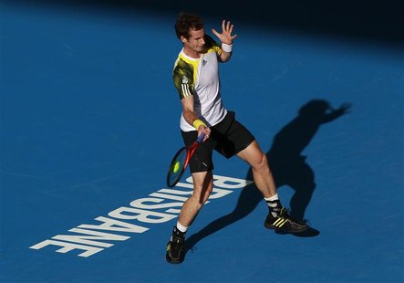 Andy Murray of Britain hits a return to Denis Istomin of Uzbekistan during their men's singles match at the Brisbane International tennis to Andy Murray of Britain hits a return to Denis Istomin of Uzbekistan during their men's singles match at the Brisbane International tennis to