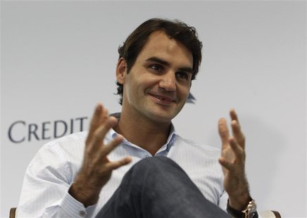 Tennis player Roger Federer of Switzerland speaks during a media event in Singapore January 4, 2013. REUTERS/Edgar Su Tennis player Roger Federer of Switzerland speaks during a media event in Singapore January 4, 2013. REUTERS/Edgar Su
