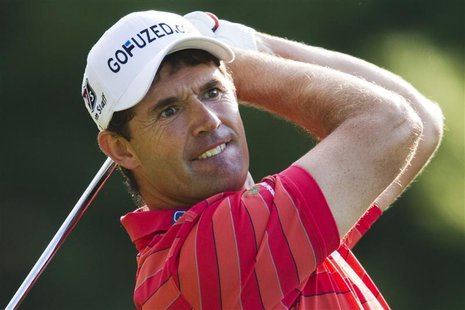 Padraig Harrington of Ireland tees off at the 11th hole during the first round of the Deutsche Bank Championship golf tournament in Norton, Padraig Harrington of Ireland tees off at the 11th hole during the first round of the Deutsche Bank Championship golf tournament in Norton,