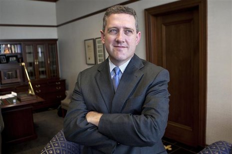 President and CEO of the Federal Reserve Bank of St. Louis James Bullard poses during an interview at the Federal Reserve Bank of St. Louis President and CEO of the Federal Reserve Bank of St. Louis James Bullard poses during an interview at the Federal Reserve Bank of St. Louis