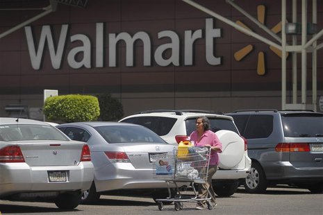 A shopper carts her purchases from a Wal-Mart store in Mexico City, April 24, 2012. REUTERS/Edgard Garrido A shopper carts her purchases from a Wal-Mart store in Mexico City, April 24, 2012. REUTERS/Edgard Garrido