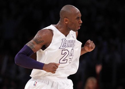 Los Angeles Lakers' Kobe Bryant celebrates after scoring against the New York Knicks during the second half of their NBA basketball game in Los Angeles Lakers' Kobe Bryant celebrates after scoring against the New York Knicks during the second half of their NBA basketball game in