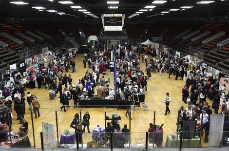 Participants enter previous years of the Southwest Michigan Bridal Show and interact with different vendors helping to plan their perfect wedding. Photo courtesy of swmichiganbridalshow.com. Participants enter previous years of the Southwest Michigan Bridal Show and interact with different vendors helping to plan their perfect wedding. Photo courtesy of swmichiganbridalshow.com.