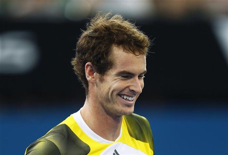 Andy Murray of Britain smiles during his men's singles semi-final match against Kei Nishikori of Japan at the Brisbane International tennis Andy Murray of Britain smiles during his men's singles semi-final match against Kei Nishikori of Japan at the Brisbane International tennis