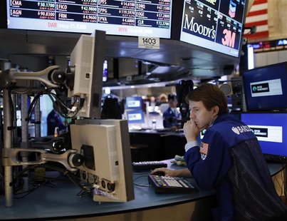 A trader looks at computer monitors while working on the floor of the New York Stock Exchange November 5, 2012. REUTERS/Chip East A trader looks at computer monitors while working on the floor of the New York Stock Exchange November 5, 2012. REUTERS/Chip East