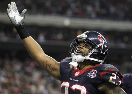 Houston Texans running back Arian Foster celebrates after scoring a touchdown against the Cincinnati Bengals during the third quarter of the Houston Texans running back Arian Foster celebrates after scoring a touchdown against the Cincinnati Bengals during the third quarter of the