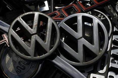 Old Volkswagen emblems are displayed with other car companies logos at antique market in Olszyny near Szczytno, northern Poland July 22, 201 Old Volkswagen emblems are displayed with other car companies logos at antique market in Olszyny near Szczytno, northern Poland July 22, 201