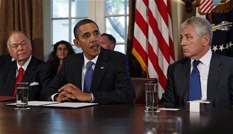 U.S. President Barack Obama (C) meets with co-chairmen of the President's Intelligence Advisory Board former Senator Chuck Hagel (R-NE)(R) a U.S. President Barack Obama (C) meets with co-chairmen of the President's Intelligence Advisory Board former Senator Chuck Hagel (R-NE)(R) a