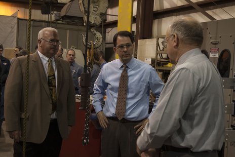 Left, L&S Exec. VP Paul Gullickson. Center, WI Governor Scott Walker Left, L&S Exec. VP Paul Gullickson. Center, WI Governor Scott Walker