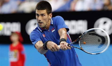 Novak Djokovic of Serbia hits a return to Fernando Verdasco of Spain during their men's singles match at the Hopman Cup tennis tournament in Novak Djokovic of Serbia hits a return to Fernando Verdasco of Spain during their men's singles match at the Hopman Cup tennis tournament in