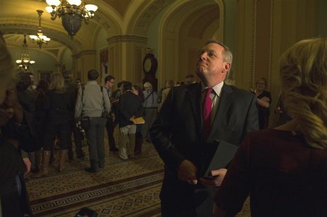 Sen. Dick Durbin (D-IL) speaks to reporters after leaving the Mansfield Room following a caucus meeting at the U.S. Capitol in Washington De Sen. Dick Durbin (D-IL) speaks to reporters after leaving the Mansfield Room following a caucus meeting at the U.S. Capitol in Washington De