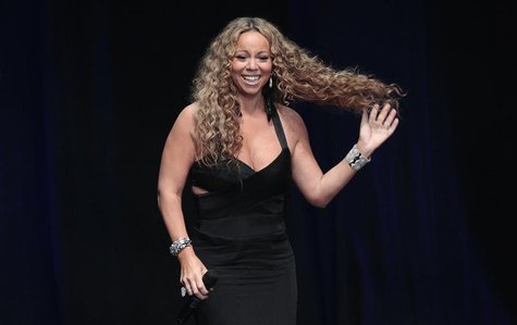 Recording artist Mariah Carey accepts the 2012 Icon Award at BMI?s annual Urban Music Awards at the Saban theatre in Beverly Hills, Californ Recording artist Mariah Carey accepts the 2012 Icon Award at BMI?s annual Urban Music Awards at the Saban theatre in Beverly Hills, Californ