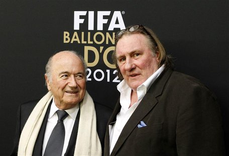 FIFA President Sepp Blatter is accompanied by French actor Gerard Depardieu (R) as he arrives before the FIFA Ballon d'Or 2012 Gala at the K FIFA President Sepp Blatter is accompanied by French actor Gerard Depardieu (R) as he arrives before the FIFA Ballon d'Or 2012 Gala at the K