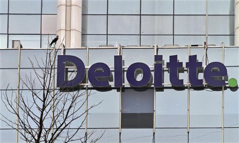 The Deloitte Company logo is seen on a commercial tower at Gurgaon, on the outskirts of New Delhi August 9, 2012. REUTERS/Parivartan Sharma The Deloitte Company logo is seen on a commercial tower at Gurgaon, on the outskirts of New Delhi August 9, 2012. REUTERS/Parivartan Sharma