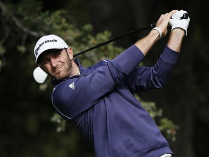 Dustin Johnson tees off on the sixth hole during the Pro-Am round of the World Challenge golf tournament in Thousand Oaks, California, Novem Dustin Johnson tees off on the sixth hole during the Pro-Am round of the World Challenge golf tournament in Thousand Oaks, California, Novem