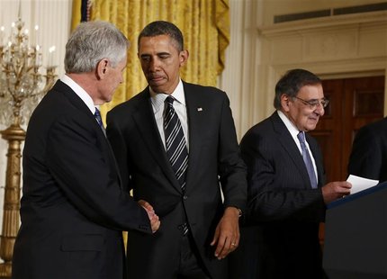 U.S. President Barack Obama (C) greets his Defense Secretary-nominee, former U.S. Senator Chuck Hagel, as current Defense Secretary Leon Pan U.S. President Barack Obama (C) greets his Defense Secretary-nominee, former U.S. Senator Chuck Hagel, as current Defense Secretary Leon Pan