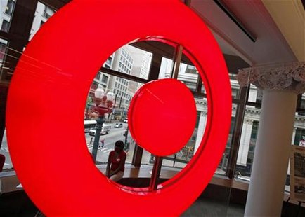 An employee at the new CityTarget store sits in a store window overlooking downtown Chicago, as they prepare for the opening, July 18, 2012. An employee at the new CityTarget store sits in a store window overlooking downtown Chicago, as they prepare for the opening, July 18, 2012.