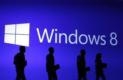 Guests are silhouetted at the launch event of Windows 8 operating system in New York, October 25, 2012. REUTERS/Lucas Jackson Guests are silhouetted at the launch event of Windows 8 operating system in New York, October 25, 2012. REUTERS/Lucas Jackson