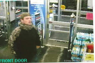 Surveillance photo from the robbery of the Walgreens at W. 9th Ave. and S. Koeller St. in Oshkosh, Jan. 8, 2013. Surveillance photo from the robbery of the Walgreens at W. 9th Ave. and S. Koeller St. in Oshkosh, Jan. 8, 2013.