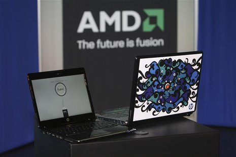 A Hewlett-Packard Pavilion dv2 laptop with an AMD Yukon platform (L) is shown next to a laptop displaying the "Engine Room" Notebook Design A Hewlett-Packard Pavilion dv2 laptop with an AMD Yukon platform (L) is shown next to a laptop displaying the "Engine Room" Notebook Design