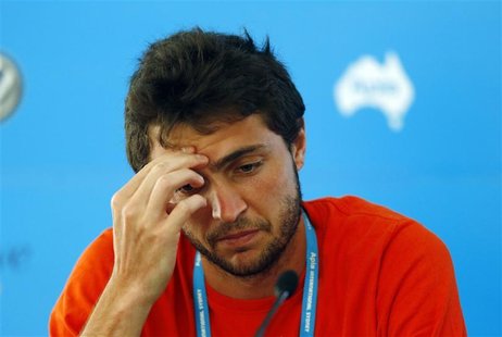 Gilles Simon of France talks during a news conference at the Sydney International tennis tournament January 9, 2013. Simon withdrew from the Gilles Simon of France talks during a news conference at the Sydney International tennis tournament January 9, 2013. Simon withdrew from the