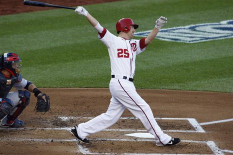 Washington Nationals' Adam LaRoche hits a solo home run against the St. Louis Cardinals during the second inning in Game 4 of their MLB NLDS Washington Nationals' Adam LaRoche hits a solo home run against the St. Louis Cardinals during the second inning in Game 4 of their MLB NLDS