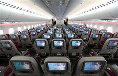 Seats and screens are seen in the economy class cabin of Qatar Airways new Boeing 787 Dreamliner are seen after it arrived on it's inaugural Seats and screens are seen in the economy class cabin of Qatar Airways new Boeing 787 Dreamliner are seen after it arrived on it's inaugural