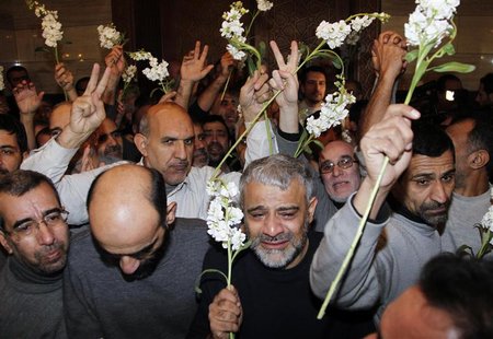 Iranians released by Syrian rebels arrive at a hotel in Damascus January 9, 2013. Forty eight Iranians released by Syrian rebels in exchange Iranians released by Syrian rebels arrive at a hotel in Damascus January 9, 2013. Forty eight Iranians released by Syrian rebels in exchange