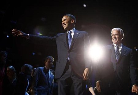 U.S. President Barack Obama (L) points to the crowd during his election night victory rally in Chicago, November 7, 2012, alongside Vice Pre U.S. President Barack Obama (L) points to the crowd during his election night victory rally in Chicago, November 7, 2012, alongside Vice Pre