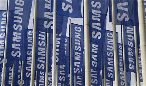 Samsung flags are set up at the main entrance to the Berlin fair ground before the IFA consumer electronics fair in Berlin, August 28, 2012. Samsung flags are set up at the main entrance to the Berlin fair ground before the IFA consumer electronics fair in Berlin, August 28, 2012.