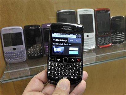 A BlackBerry device is shown in front of products displayed in a glass cabinet at the Research in Motion offices in Waterloo November 14, 20 A BlackBerry device is shown in front of products displayed in a glass cabinet at the Research in Motion offices in Waterloo November 14, 20