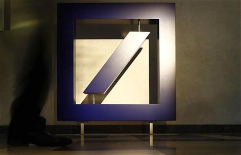 A visitor walks past the bank's logo prior to Deutsche Bank's annual news conference in Frankfurt February 2, 2012. REUTERS/Kai Pfaffenbach A visitor walks past the bank's logo prior to Deutsche Bank's annual news conference in Frankfurt February 2, 2012. REUTERS/Kai Pfaffenbach