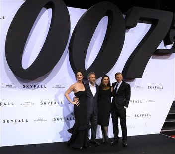 Actress Berenice Marlohe, director Sam Mendes, producer Barbara Broccoli and actor Daniel Craig (L-R) pose on the red carpet as they arrive Actress Berenice Marlohe, director Sam Mendes, producer Barbara Broccoli and actor Daniel Craig (L-R) pose on the red carpet as they arrive
