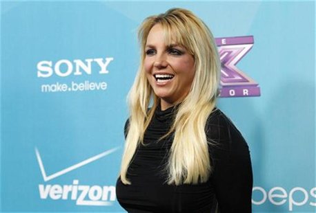 Judge Britney Spears poses at the party for the television series "The X Factor" finalists in Los Angeles, California November 5, 2012. REUT Judge Britney Spears poses at the party for the television series "The X Factor" finalists in Los Angeles, California November 5, 2012. REUT