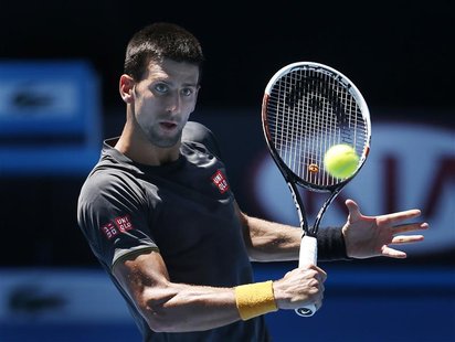 Serbia's Novak Djokovic hits the ball during a practice session at Melbourne Park January 10, 2013, ahead of the Australian Open tennis tour Serbia's Novak Djokovic hits the ball during a practice session at Melbourne Park January 10, 2013, ahead of the Australian Open tennis tour