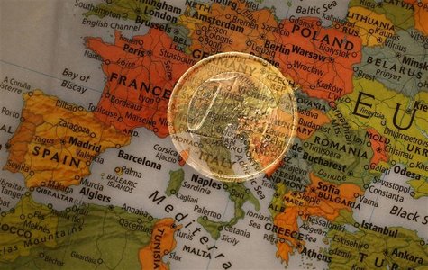 A picture illustration taken with the multiple exposure function of the camera shows a one Euro coin and a map of Europe, January 9, 2013. R A picture illustration taken with the multiple exposure function of the camera shows a one Euro coin and a map of Europe, January 9, 2013. R