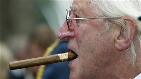 Disgraced British entertainer Jimmy Savile is seen arriving at the unveiling of a new monument, commemorating the fighter pilots who fought Disgraced British entertainer Jimmy Savile is seen arriving at the unveiling of a new monument, commemorating the fighter pilots who fought