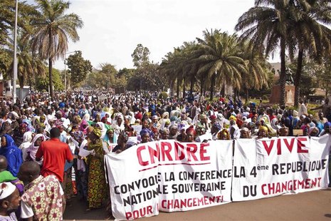 Women hold banners urging national talks to end the political paralysis in the south of Mali, in the capital Bamako January 10, 2013. Mali's Women hold banners urging national talks to end the political paralysis in the south of Mali, in the capital Bamako January 10, 2013. Mali's